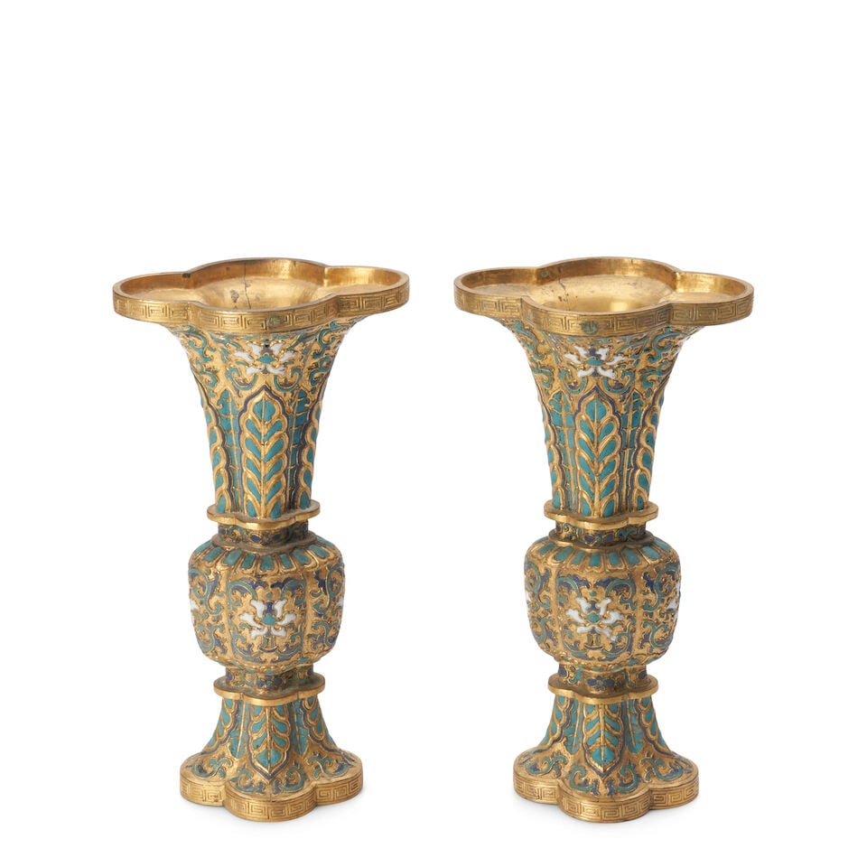 A PAIR OF CHAMPLEVÉ ENAMEL VASES, GU 18th/19th century (2): A PAIR OF CHAMPLEVÉ ENAMEL VASES, GU 18th/19th century 11 1/2in (29.2cm) high (2). Footnotes: 十八/十九世紀