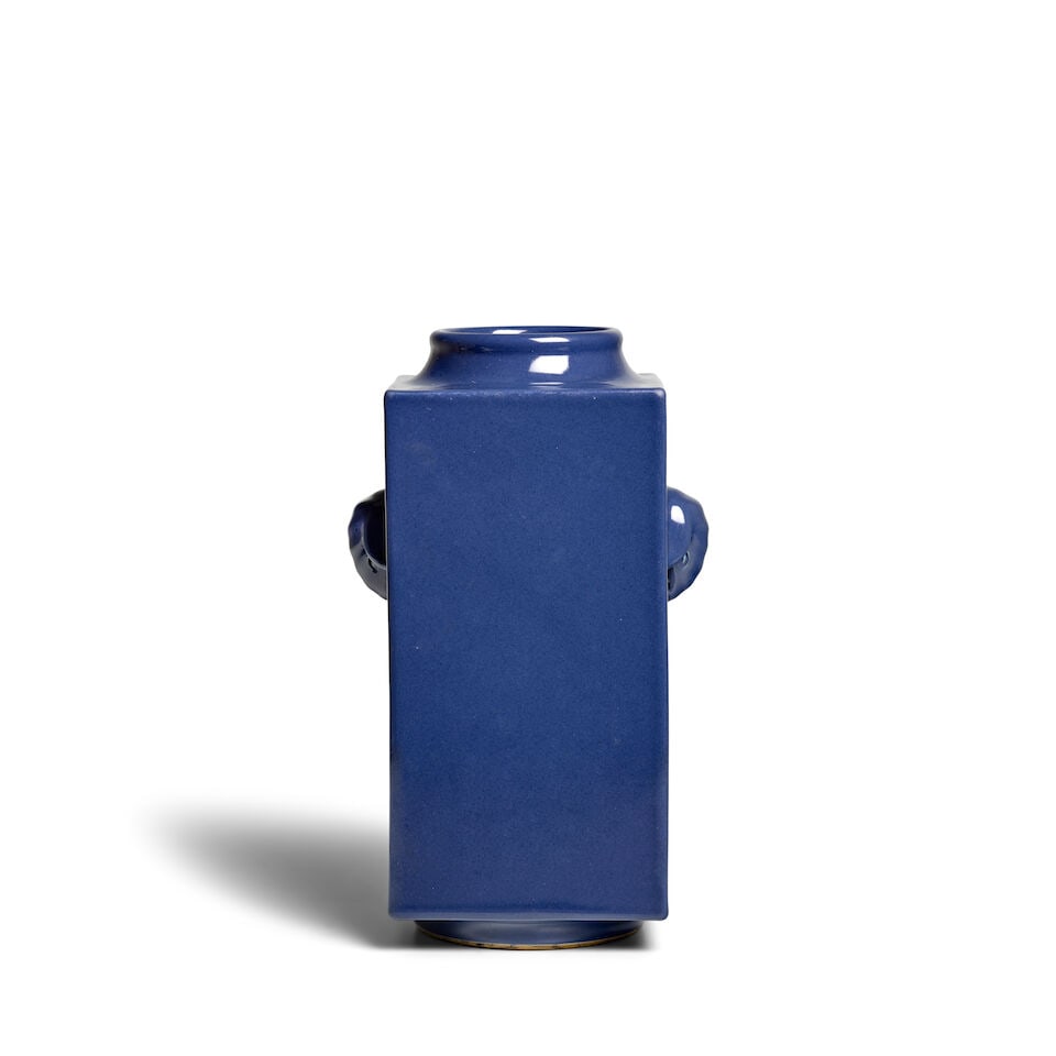 A BLUE-GLAZED CONG VASE Guangxu six-character mark: A BLUE-GLAZED CONG VASE Guangxu six-character mark 12in (30.5cm) high; wood stand Footnotes: 光緒六字楷書款