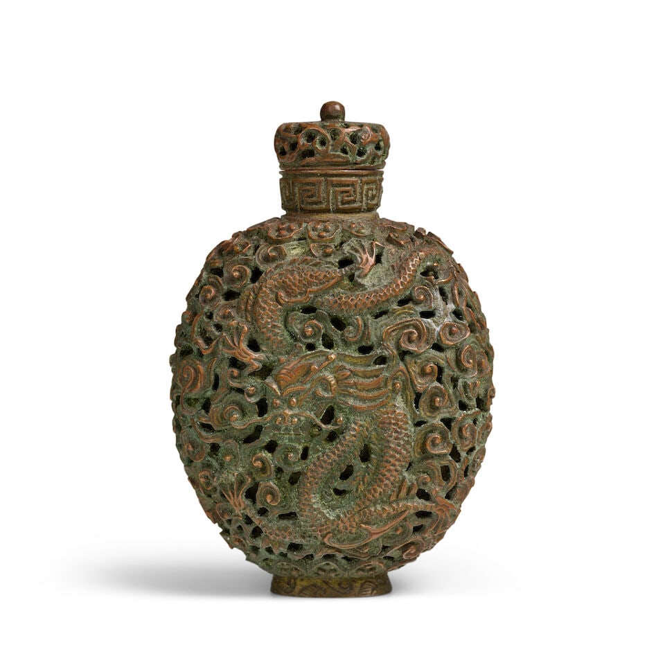 A HEAVILY-CAST RETICULATED COPPER-BRONZE 'DRAGON AND PHOENIX' SNUFF BOTTLE 1850-1920 (1 of 3)