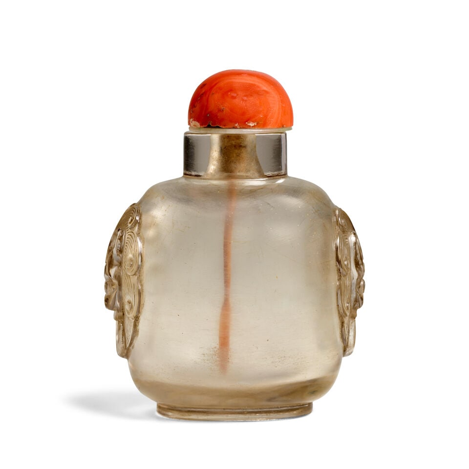 A PLAIN, ROUNDCED SQUARE PALE SMOKY CRYSTAL 'LARGE LION-MASK-HANDLED' SNUFF BOTTLE 1780-1880 (1 of 3)