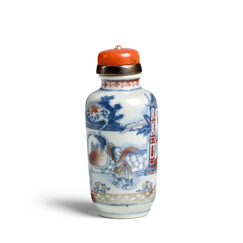 A CYLINDRICAL BLUE AND WHITE AND UNDERGLAZER-COPPER-RED 'BEDROOM SCENE FROM A ROMANCE' PORCELIAN...: A CYLINDRICAL BLUE AND WHITE AND UNDERGLAZER-COPPER-RED 'BEDROOM SCENE FROM A ROMANCE' PORCELIAN SNUFF BOTTLE 1800-1900 2 3/4in (7cm) high, stopper Footnotes: 1800-1900