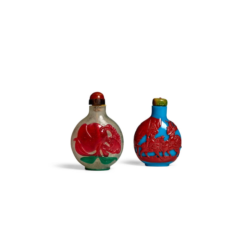 A DOUBLE OVERLAY SEMI-TRANSPARENT MISTY GLASS SNUFF BOTTLE AND A RED OVERLAY TURQUOISE GLASS SNU... (1 of 2)