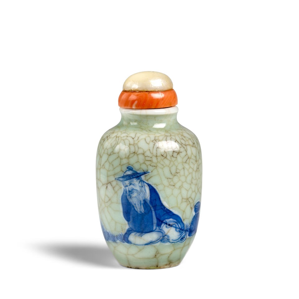 AN OVIFROM, BLUE AND WHITE AND CRACKLED CELADON-GROUND 'SEATED FISHERMAN' PORCELAIN SNUFF JAR 18... (1 of 2)