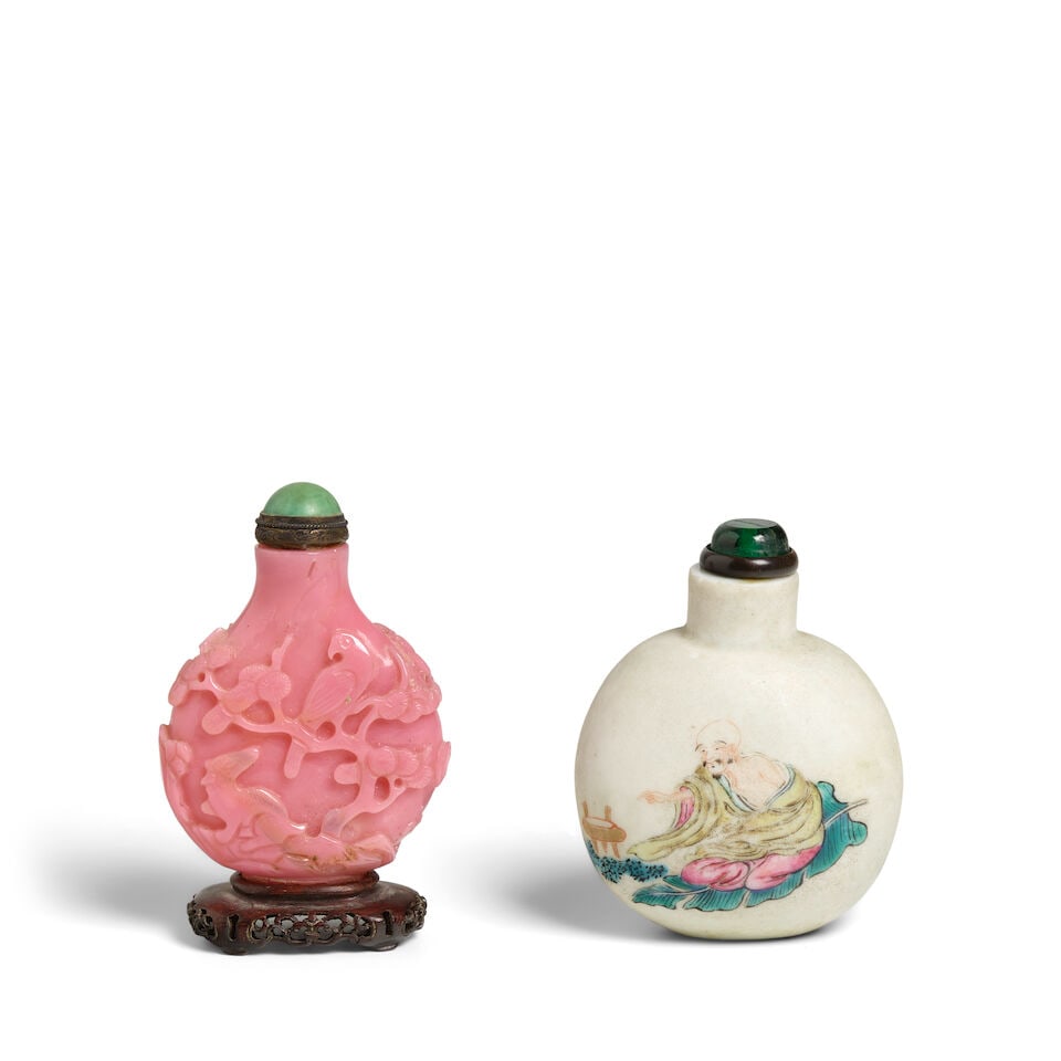 TWO SNUFF BOTTLES: ONE PINK GLASS 'LANDSCAPE AND ANIMAL' SNUFF BOTTLE; THE OTHER FAMILLE ROSE BI... (1 of 2)