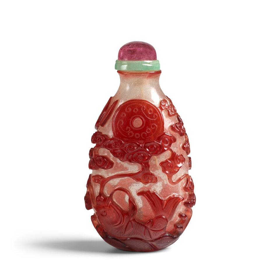 A PEAR-SHAPED TRANSPARENT RED OVERLAY BUBBLE-SUFFUSED CLEAR GLASS 'PLUME EMITTING CARP SUPPORTIN... - 2