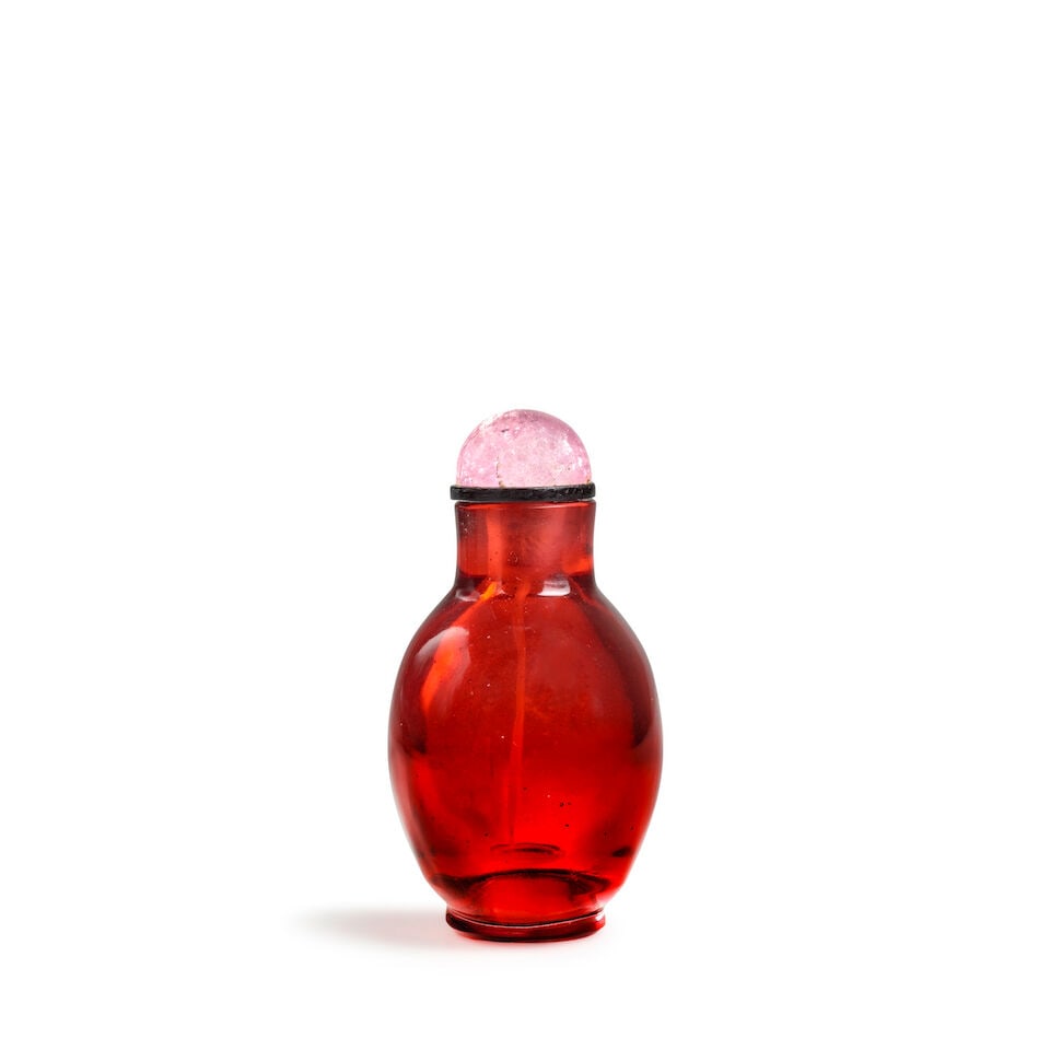 A SMALL BULBOUS, ROUNDED TRANSPARENT RED GLASS BOTTLE & A SMALL CIRCULAR TRANSPARENT RED GLASS S - 2