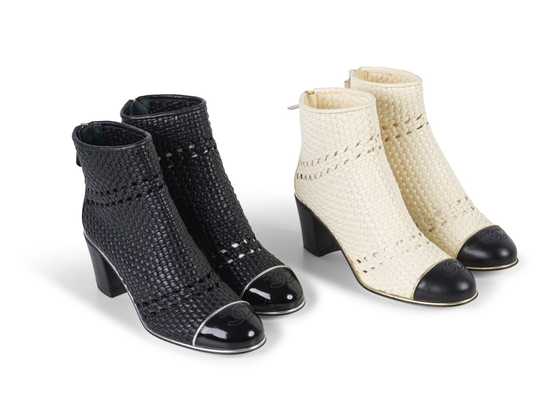 Chanel. Deux paires de bottines en cuir agneau tissé noir et blanc. Chanel. Two pairs of an...: Chanel. Deux paires de bottines en cuir agneau tissé noir et blanc. Chanel. Two pairs of ankle boots in black and white woven lambskin leather. Condition grade: A. Pointure indiquée/Size ind