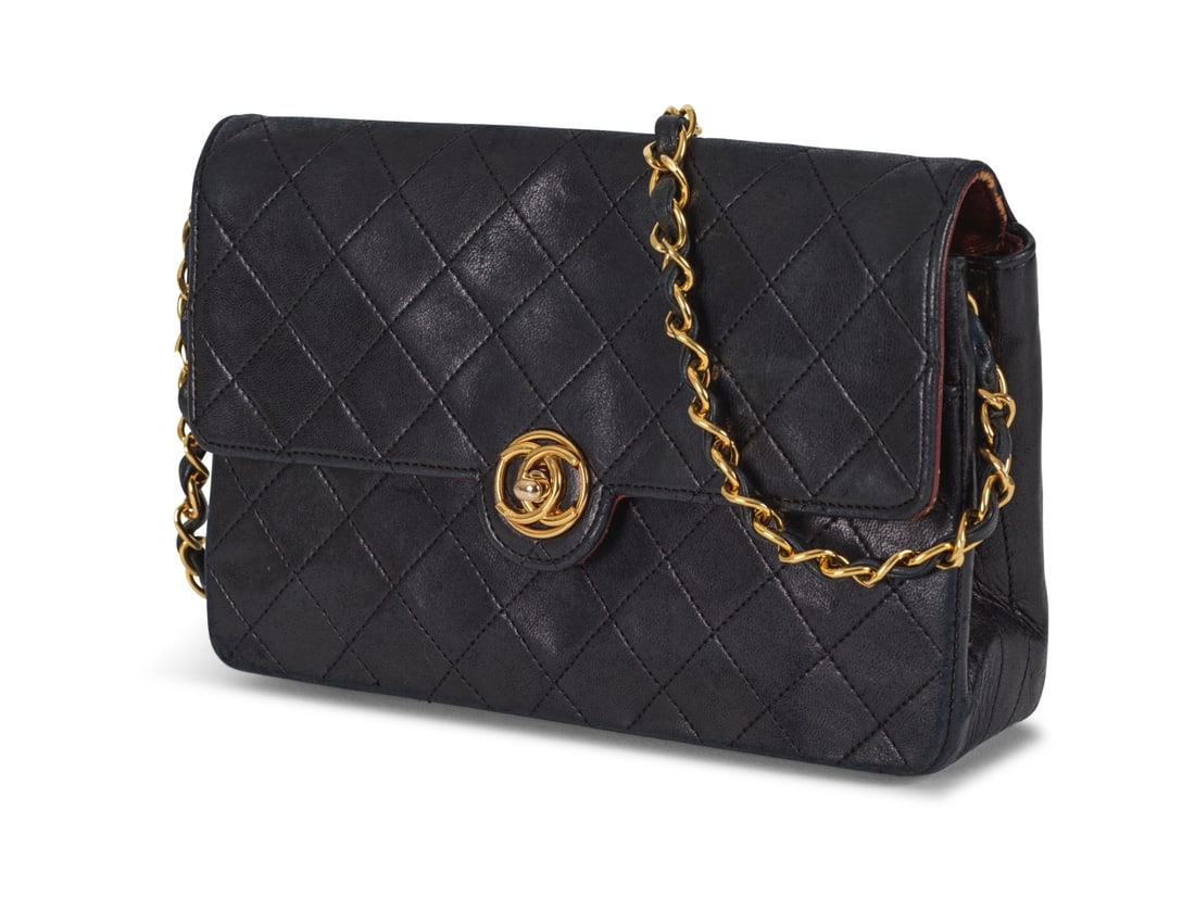 Chanel, années 1990. Sac Classique en cuir agneau matelassé noir. Chanel, 1990s. Class... (1 of 1)