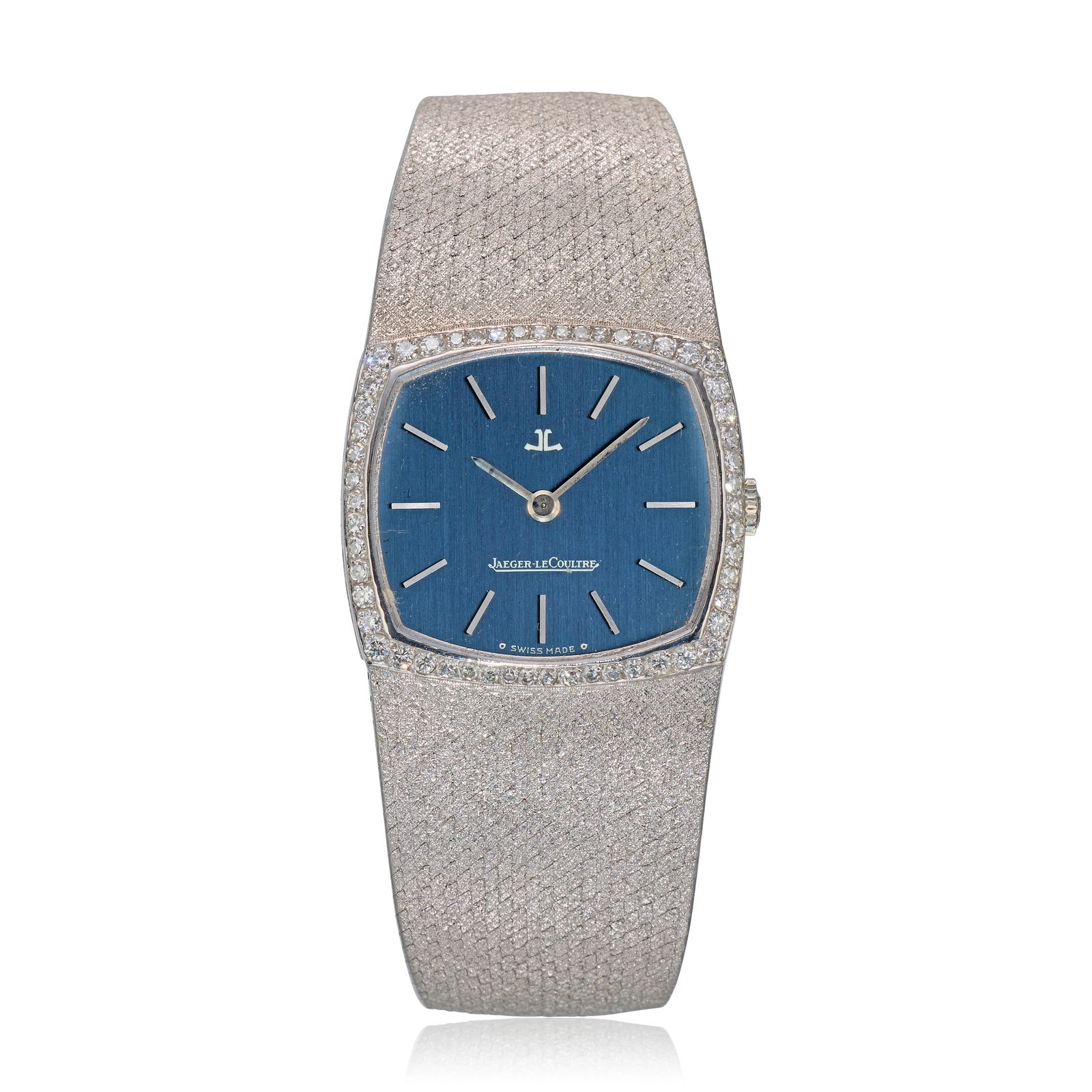 Jaeger-LeCoultre. An 18K white gold diamond set manual wind bracelet watch with sigma dial Circa...: Jaeger-LeCoultre. An 18K white gold diamond set manual wind bracelet watch with sigma dial Date: Circa 1970 Movement: Jewelled manual wind, No.2097880 Dial: Blue, applied white gold baton hour markers