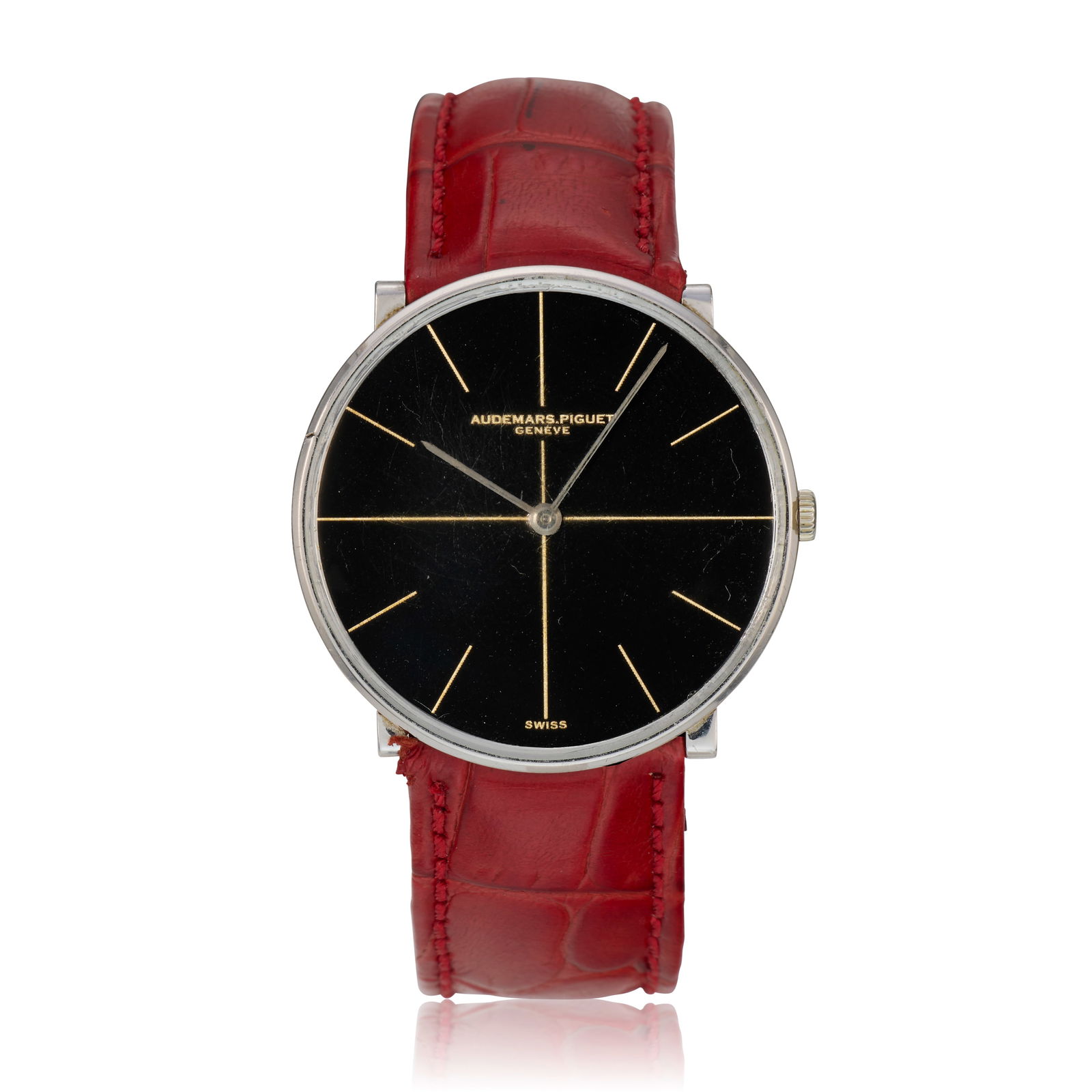 Audemars Piguet. A slim 18K white gold manual wind wristwatch Circa 1965: Audemars Piguet. A slim 18K white gold manual wind wristwatch Date: Circa 1965 Movement: 17-jewel Cal.2003 manual wind, No.87990 Dial: Black crosshair, gilt baton hour markers, polished pointed baton