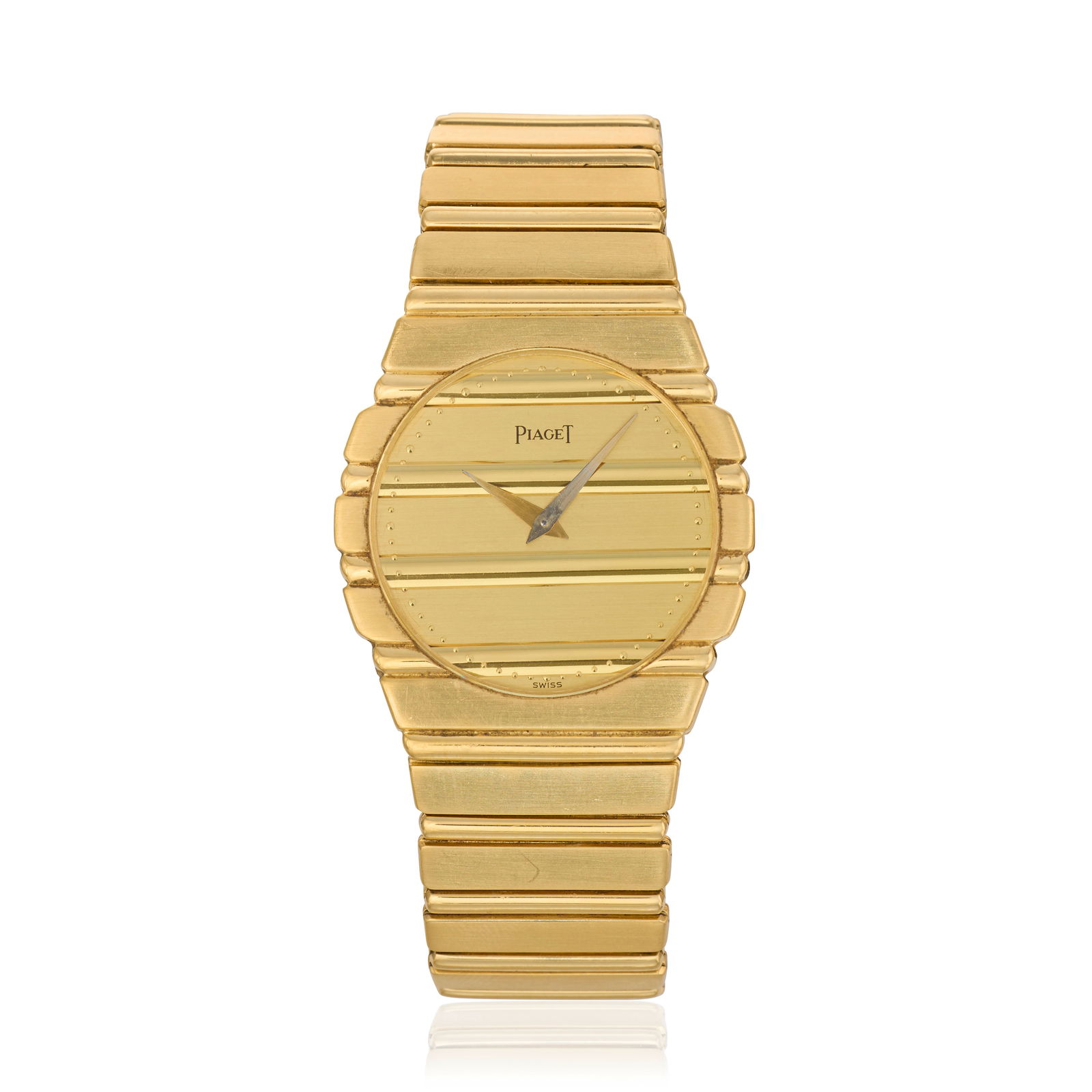 Piaget. An 18K gold quartz bracelet watch Polo, Ref: 7561 C 701, Circa 1980: Piaget. An 18K gold quartz bracelet watch Model: Polo Reference: 7561 C 701 Date: Circa 1980 Movement: 4-jewel Cal.757P quartz, No. Dial: Brushed and polished gilt, applied gilt dot outer minute divis