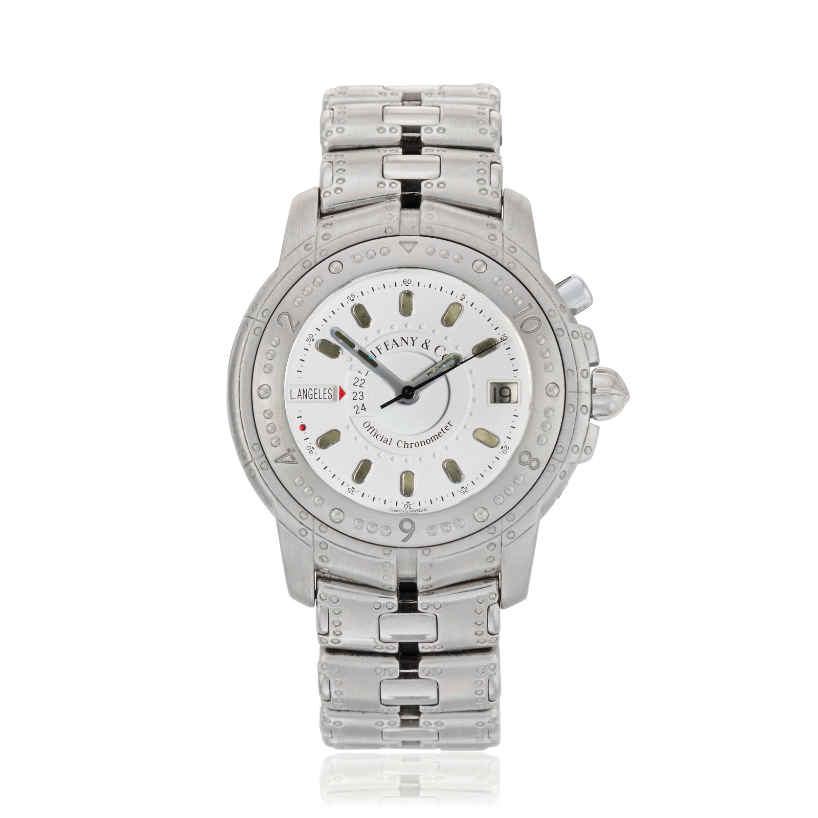 Tiffany & Co. A rare and heavy 18K white gold automatic calendar bracelet watch with world time ...: Tiffany & Co. A rare and heavy 18K white gold automatic calendar bracelet watch with world time indication Model: Streamerica World Time Reference: M1466 Date: Circa 1995 Movement: Jewelled automatic,