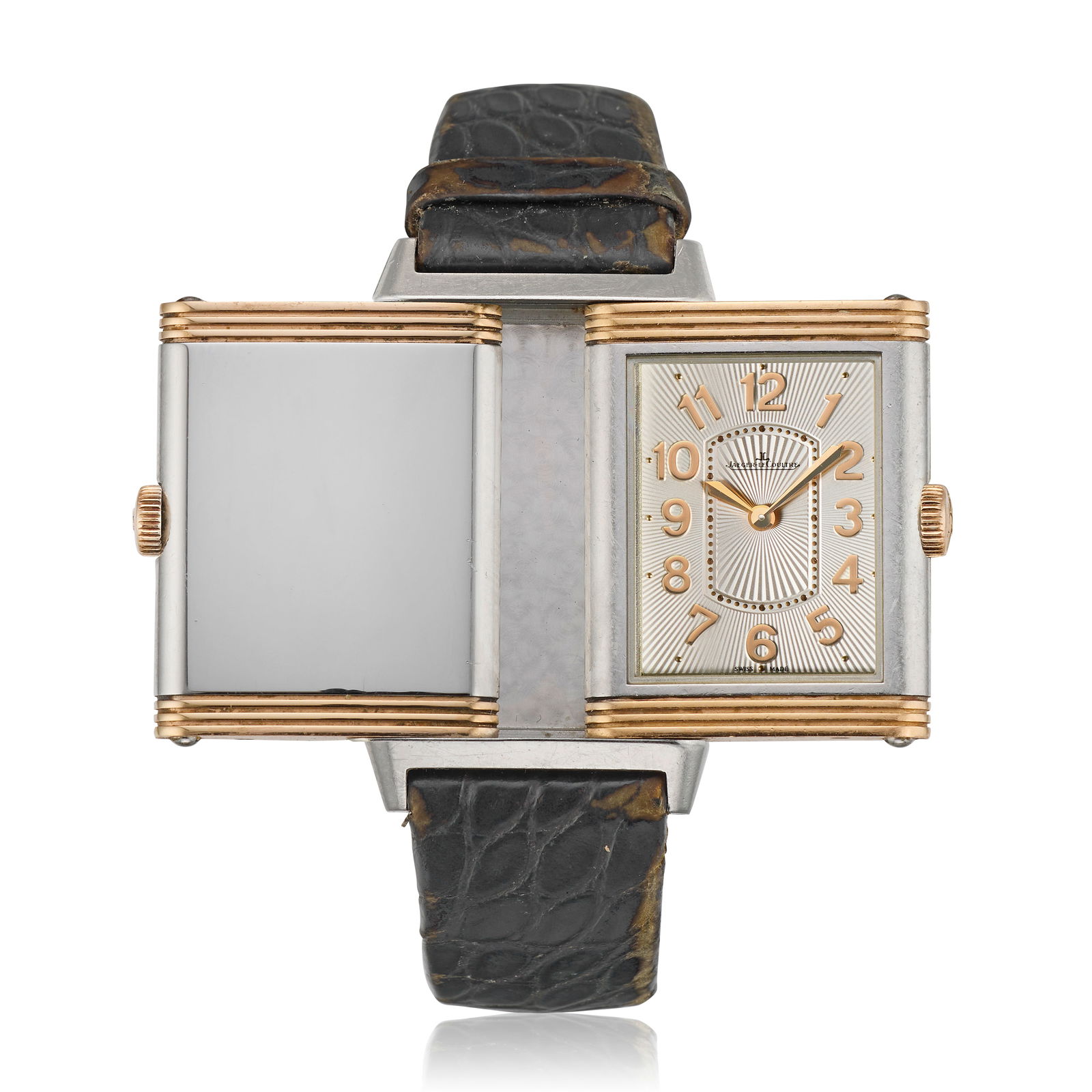Jaeger-LeCoultre. A stainless steel and rose gold quartz reversible rectangular wristwatch Reve...: Jaeger-LeCoultre. A stainless steel and rose gold quartz reversible rectangular wristwatch Model: Reverso Reference: 268.D.47 Date: Circa 2015 Movement: Jewelled quartz Dial: Guilloché engraved s