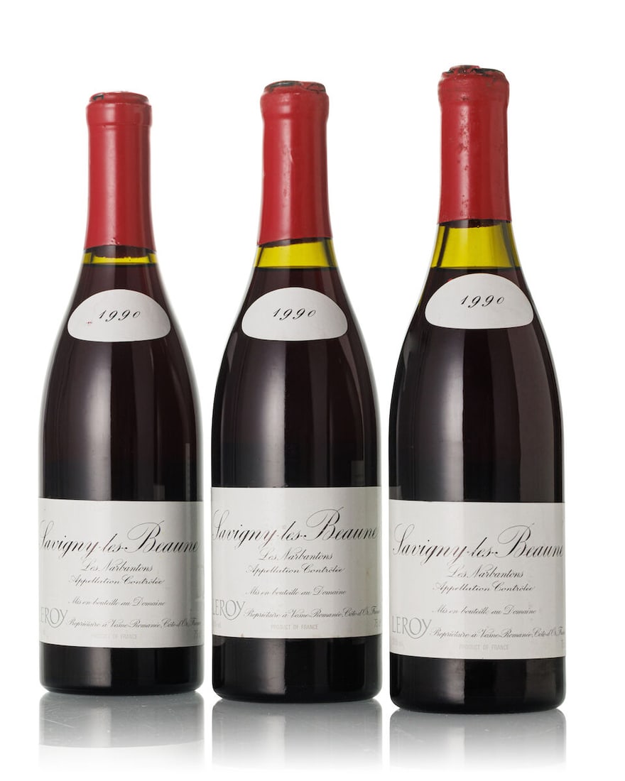 Domaine Leroy Savigny-lès-Beaune Les Narbantons, 1990 (3x 750ml): Domaine Leroy Savigny-lès-Beaune Les Narbantons, 1990 (3x 750ml) Region: Burgundy Fill Level: 2x 1.5cm, 1x 2.5cm Capsule: 2x slightly damaged wax capsule, 1x damaged wax capsule revealing cork La