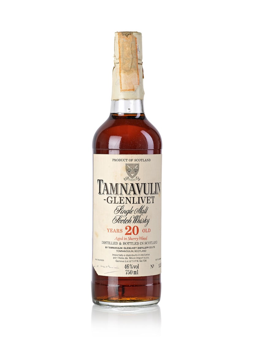 Tamnavulin Glenlivet 20 Year Old (1x 750ml): Tamnavulin Glenlivet 20 Year Old (1x 750ml) Region: Speyside Fill Level: base neck Capsule: slightly stained capsule Label: stained and torn label Alcohol content: 46% ABV Notes: distilled and