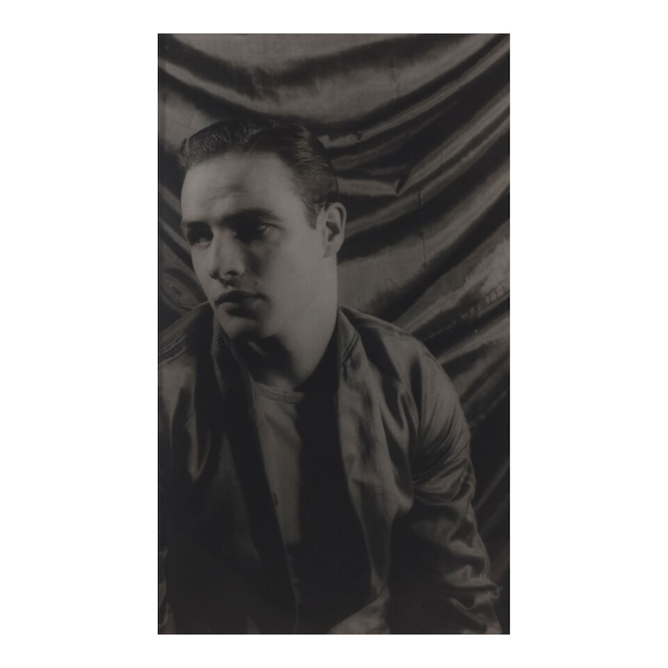 CARL VAN VECHTEN (1880-1964); Marlon Brando (in 'A Streetcar Named Desire');: CARL VAN VECHTEN (1880-1964) Marlon Brando (in 'A Streetcar Named Desire'), 1948 Gelatin silver print on post card paper. 5 1/2 x 3 1/2 in. (14 x 8.9 cm.) Footnotes: Provenance Peter Fetterman