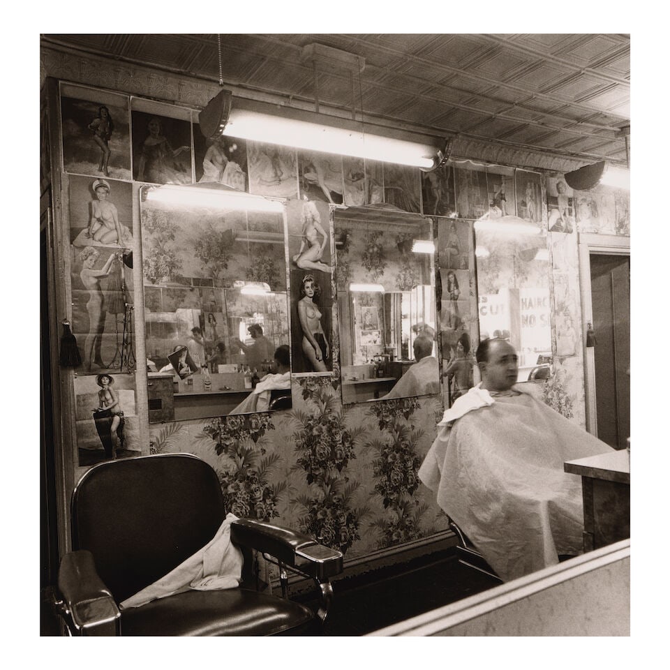 Diane Arbus (1923-1971); Pin-up collection at a barber shop, N.Y.C.;: Diane Arbus (1923-1971) Pin-up collection at a barber shop, N.Y.C., 1963 Gelatin silver print, printed between 1963 and 1965; the 'A Diane Arbus Print' stamp, signed and numbered '#3644-5-1U-1114' in
