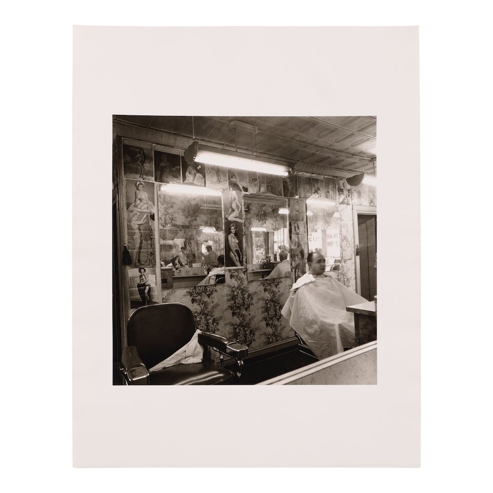 Diane Arbus (1923-1971); Pin-up collection at a barber shop, N.Y.C.; - 2