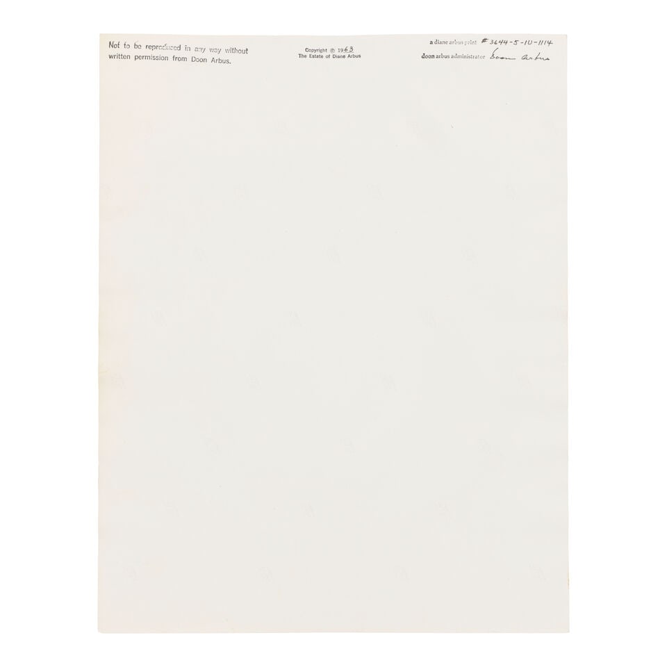 Diane Arbus (1923-1971); Pin-up collection at a barber shop, N.Y.C.; - 3