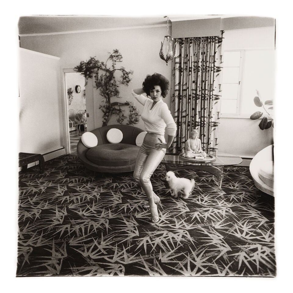 Diane Arbus (1923-1971); Blaze Starr in her living room, Baltimore, MD;: Diane Arbus (1923-1971) Blaze Starr in her living room, Baltimore, MD, 1964 Gelatin silver print, printed posthumously by Neil Selkirk; the 'A Diane Arbus photograph' stamp, signed by Doon Arbus and w