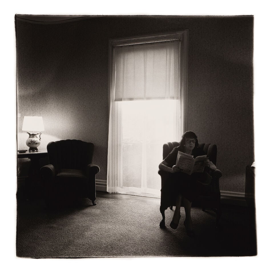 Diane Arbus (1923-1971); Lady in a rooming house parlor, Albion, NY;: Diane Arbus (1923-1971) Lady in a rooming house parlor, Albion, NY, 1963 Gelatin silver print, printed posthumously by Neil Selkirk; the 'A Diane Arbus photograph' stamp, signed by Doon Arbus and with
