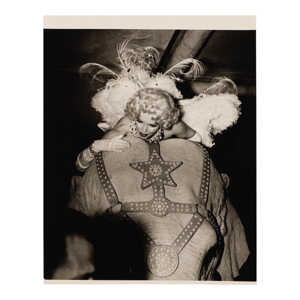 Weegee (Arthur Fellig) (1899-1968); Marilyn Monroe on a Pink Elephant (Opening Night of the Ring... - 2
