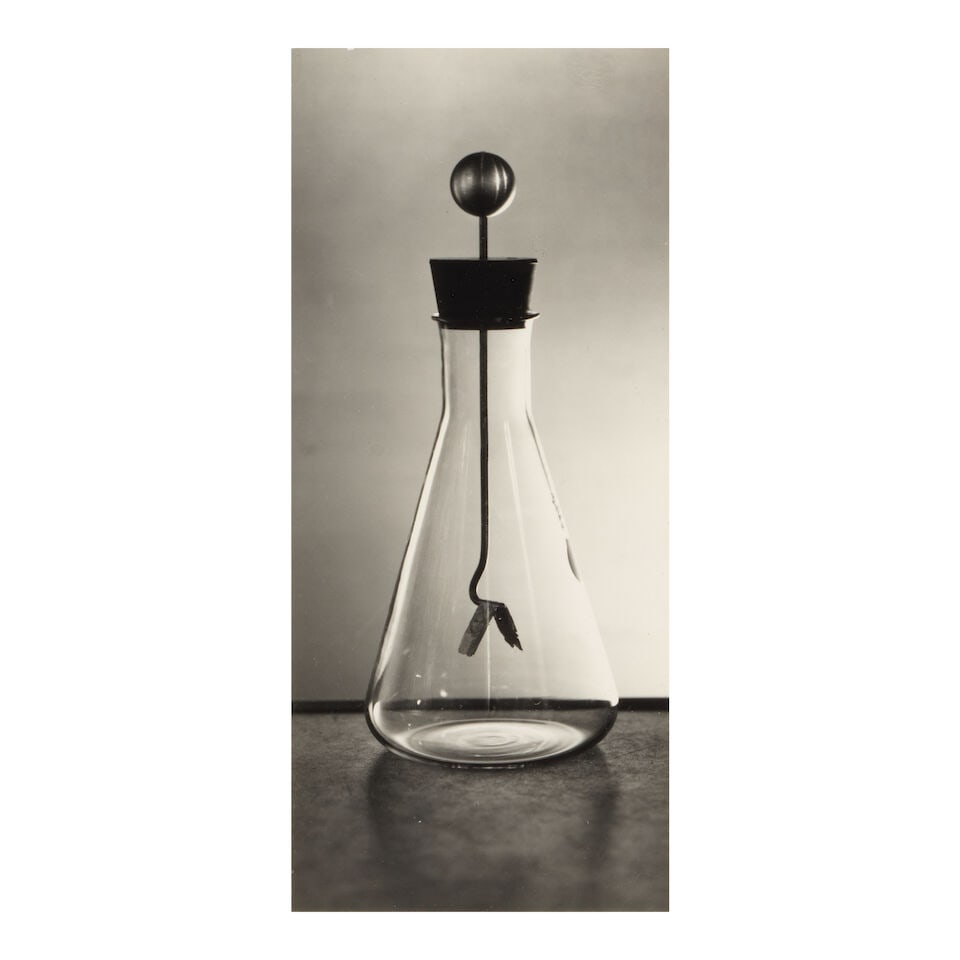 Berenice Abbott (1898-1991); Gold Leaf Electroscope;: Berenice Abbott (1898-1991) Gold Leaf Electroscope, c. 1960 Gelatin silver print; mounted, signed in pencil on the mount, the photographer's '50 Commerce Street' studio stamp on the reverse, framed. 7