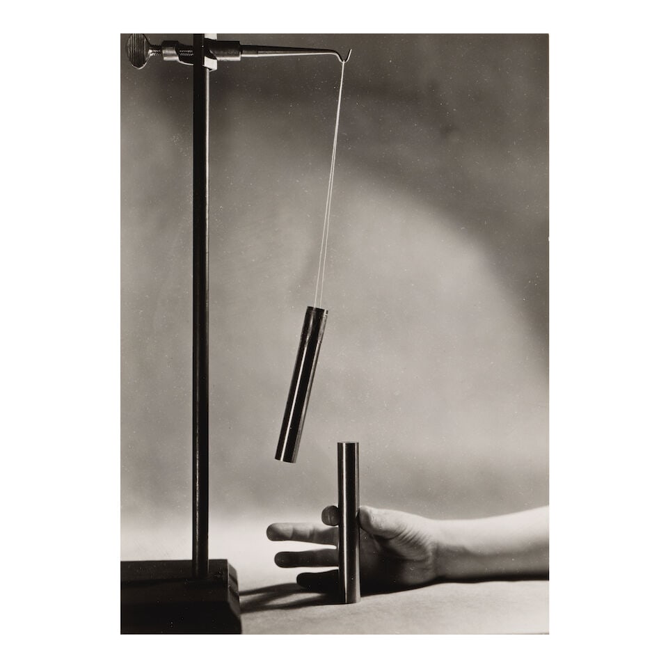 Berenice Abbott (1898-1991); Magnetic Polarity;: Berenice Abbott (1898-1991) Magnetic Polarity, c. 1960 Gelatin silver print; mounted to the reverse of a test print, signed in pencil on the mount, framed. 8 1/8 x 5 7/8 in. (20.6 x 14.9 cm.) mount