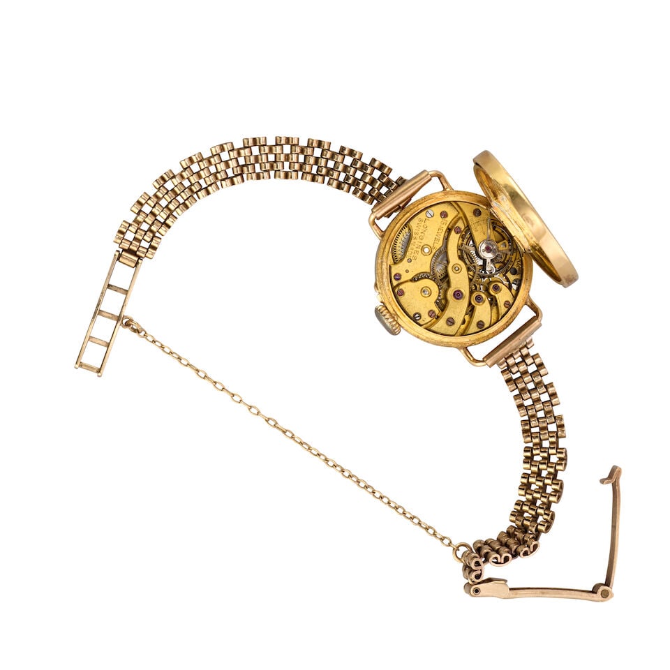 Longines. A lady's continental gold enamel and diamond set manual wind bracelet watch Circa 1930 - 2