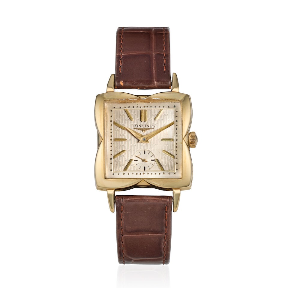 Longines. A 14K gold manual wind wristwatch Ref: LK 86, Circa 1953 (1 of 3)