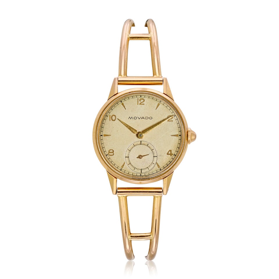 Movado. An 18K gold manual wind cuff watch Circa 1960 (1 of 3)