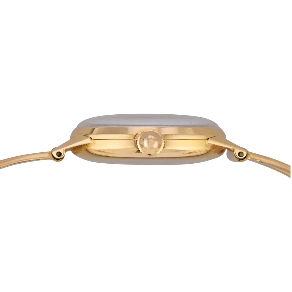 Movado. An 18K gold manual wind cuff watch Circa 1960 - 2