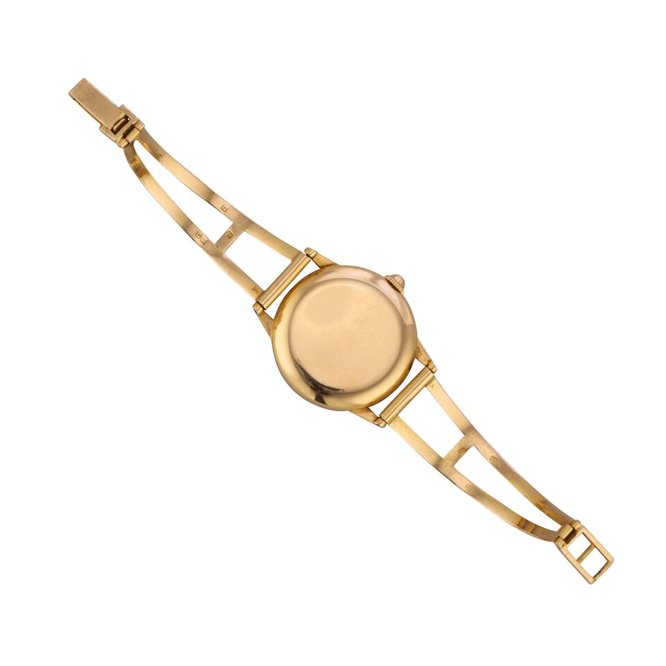 Movado. An 18K gold manual wind cuff watch Circa 1960 - 3