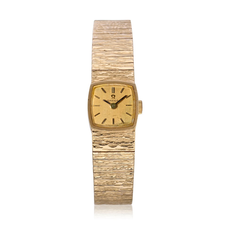 Omega. A lady's 9K gold quartz bracelet watch London Hallmark for 1969 (1 of 3)