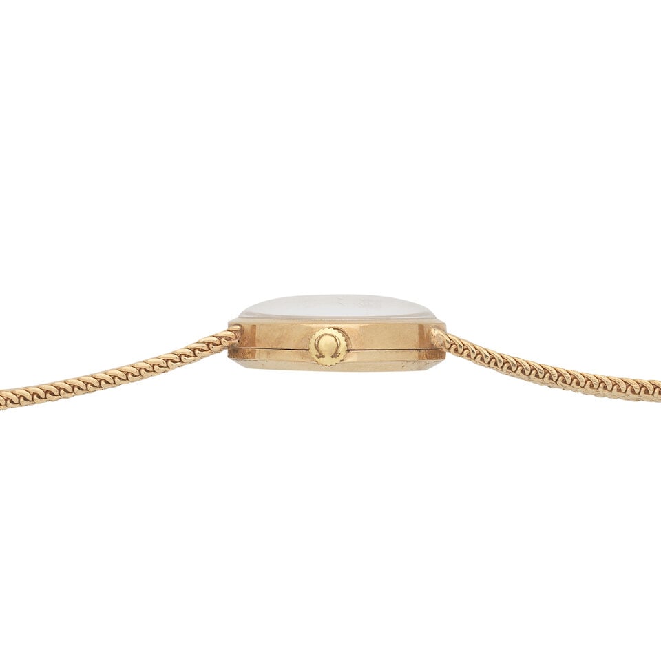 Omega. A lady's 9K gold manual wind bracelet watch London Hallmark for 1968 - 2