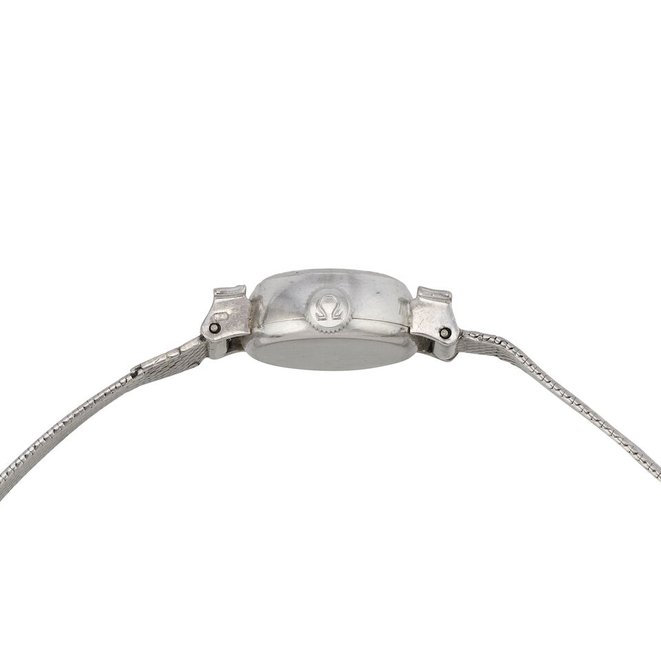 Omega. A lady's 18K white gold diamond set manual wind bracelet watch Saphette, Circa 1965 - 2