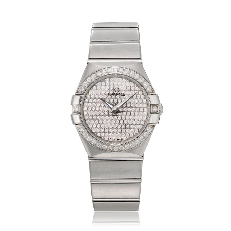 Omega. A stainless steel and diamond set quartz bracelet watch Constellation, Ref: 968.1201, Ci...: Omega. A stainless steel and diamond set quartz bracelet watch Model: Constellation Reference: 968.1201 Date: Circa 2000 Movement: 1-jewel quartz Dial: Diamond set Case: Brushed tonneau form, diamond
