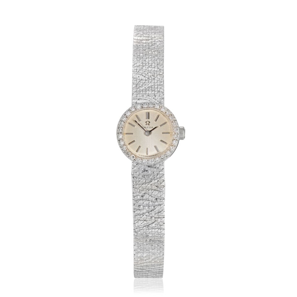 Omega. An 18K white gold diamond set manual wind bracelet watch London Hallmark for 1969 (1 of 3)