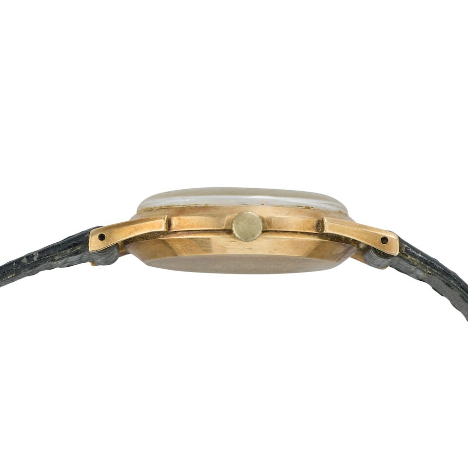 Rolex. A 9K gold manual wind wristwatch Birmingham Hallmark for 1961 - 2