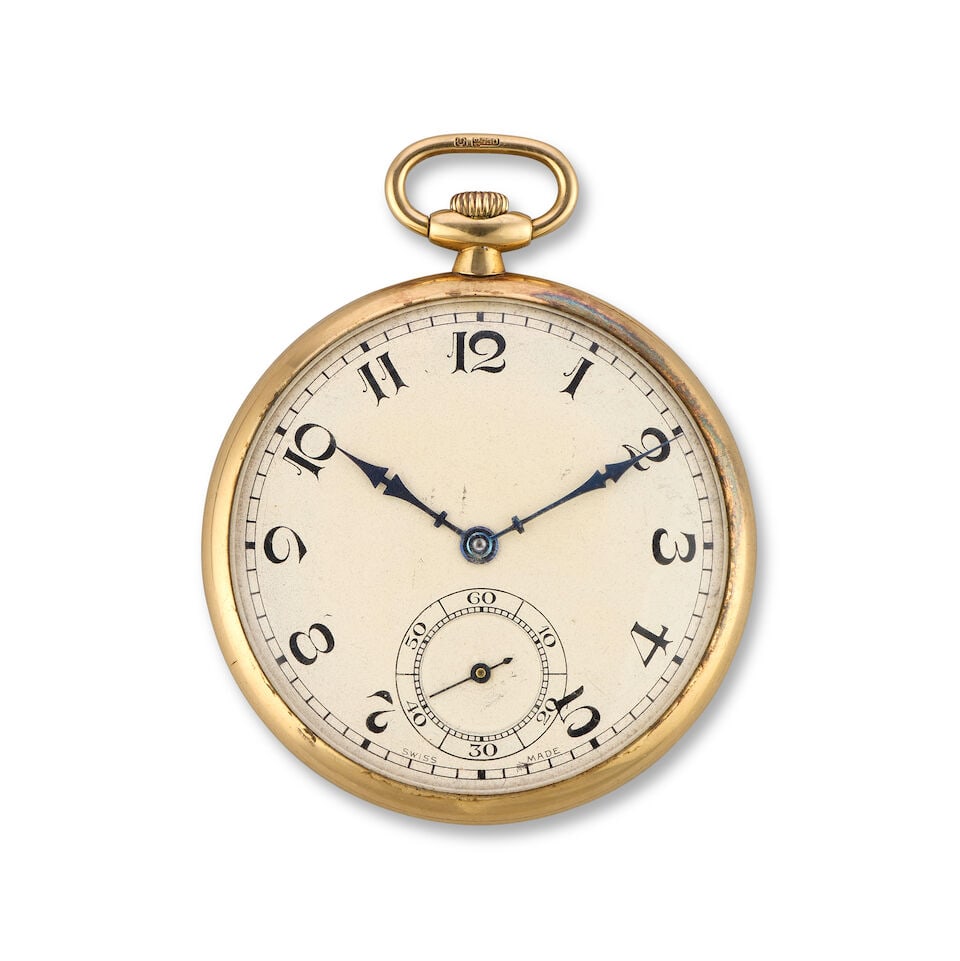 An 18K gold keyless wind open face pocket watch London Import mark for 1932 (1 of 2)