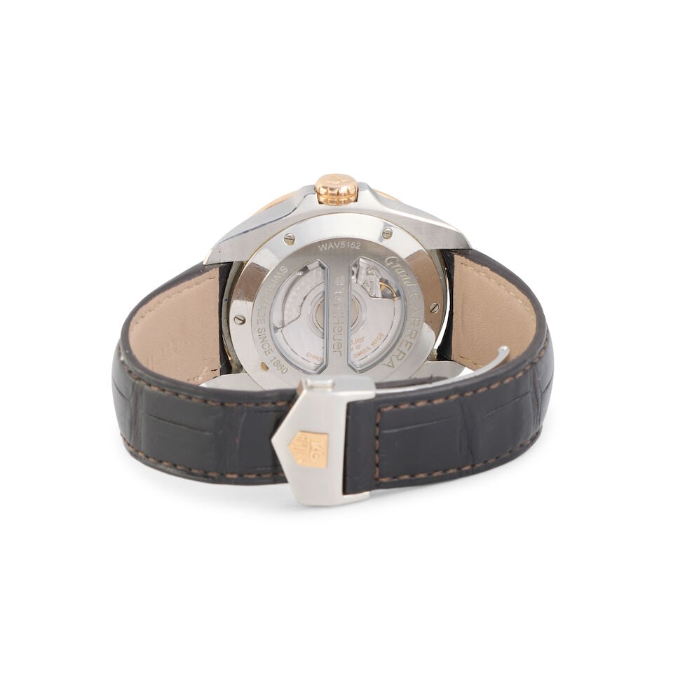 TAG Heuer. A stainless steel and rose gold automatic calendar wristwatch with dual time Grand C... - 3