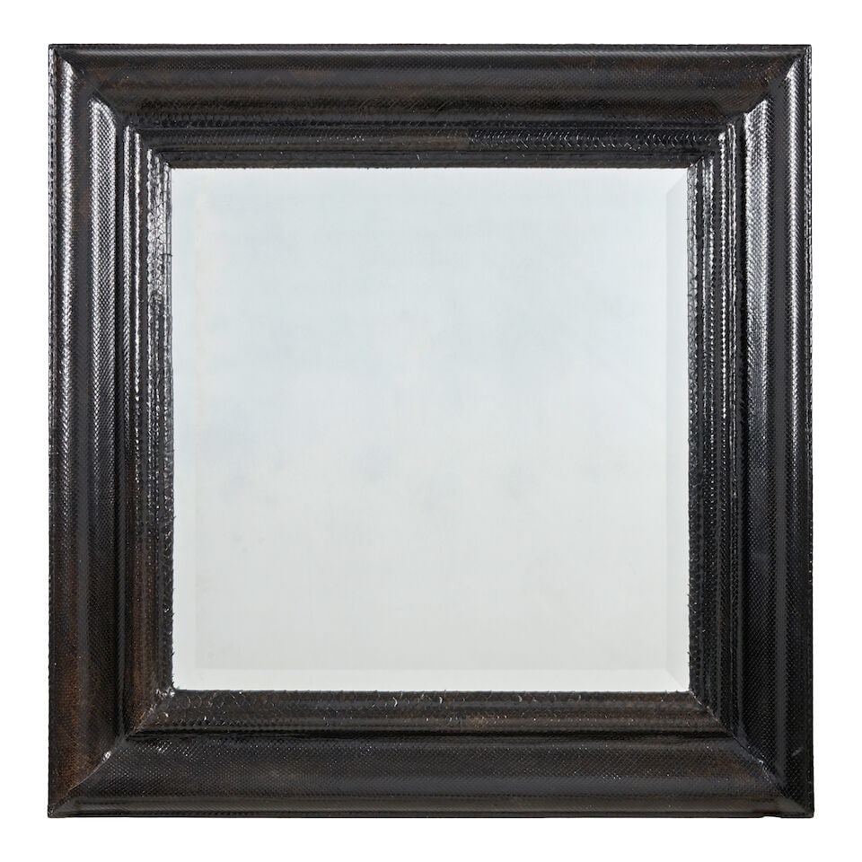 KARL SPRINGER (1931-1991) 'Molding Mirror'circa 1970wood, black cobra skin, beveled plate, unmar... (1 of 1)