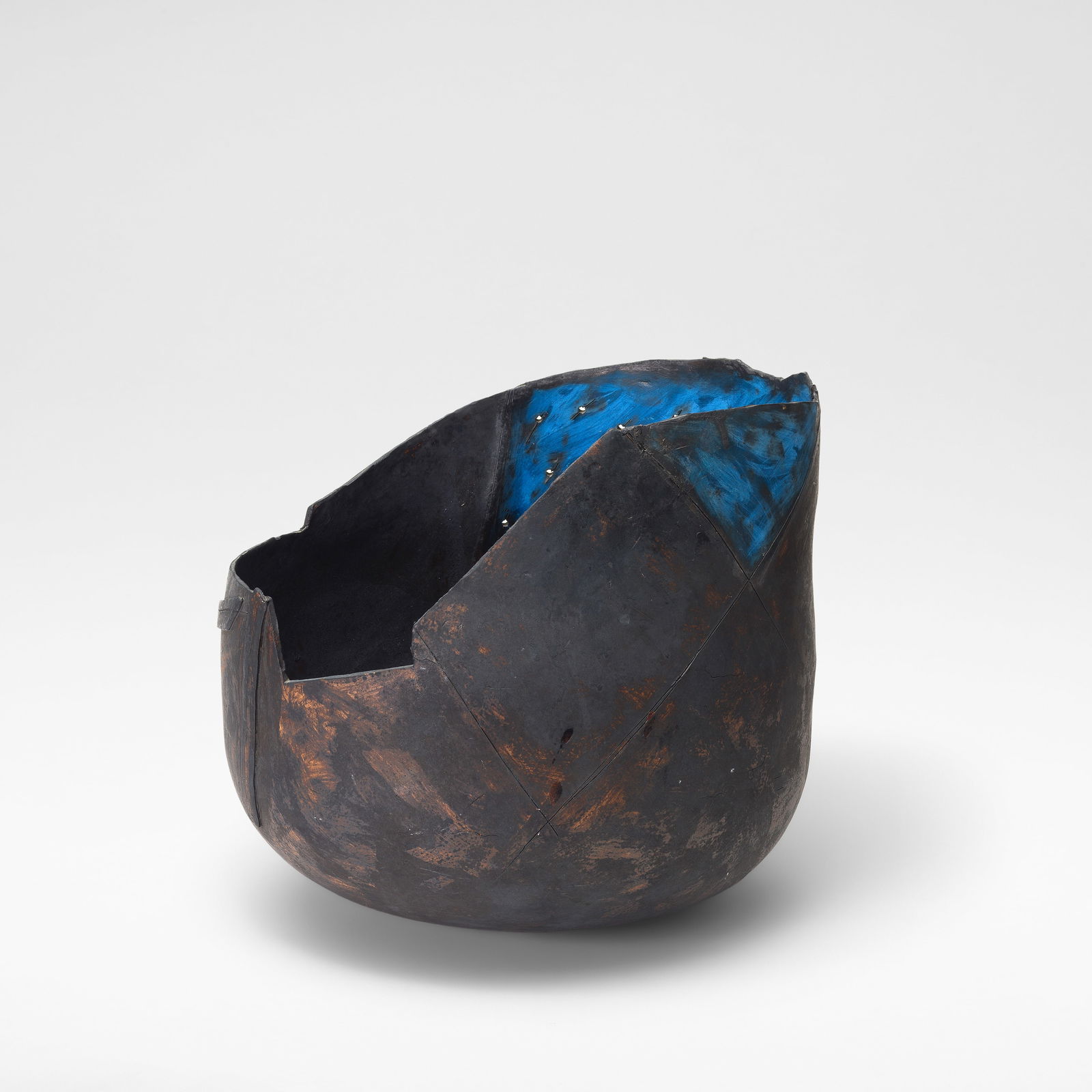 Gordon Baldwin Large bowl form, 1985: Gordon Baldwin Large bowl form, 1985 Stoneware, dry brown and blue painted slips and glazes over an incised and pierced dark brown body. 39 cm high, 42 cm wide, 45 cm deep Underside painted GB 85. Thi