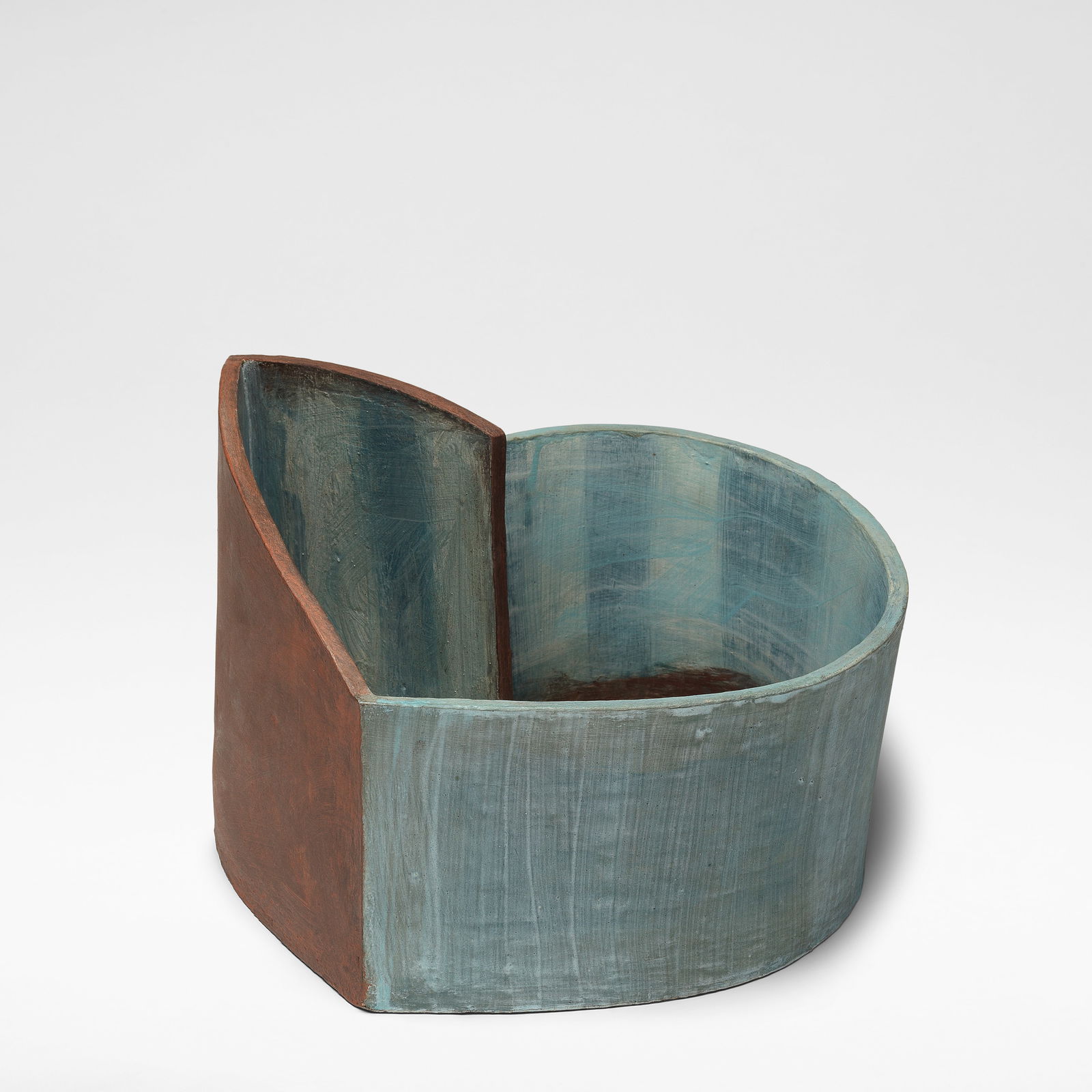 Ken Eastman Architectural vessel, 1989: Ken Eastman Architectural vessel, 1989 Stoneware, of high sided undulating form, decorated in brown and blue slips. 21 cm high, 35 cm wide, 34 cm deep Signed, dated and numbered to the base Eastman, N