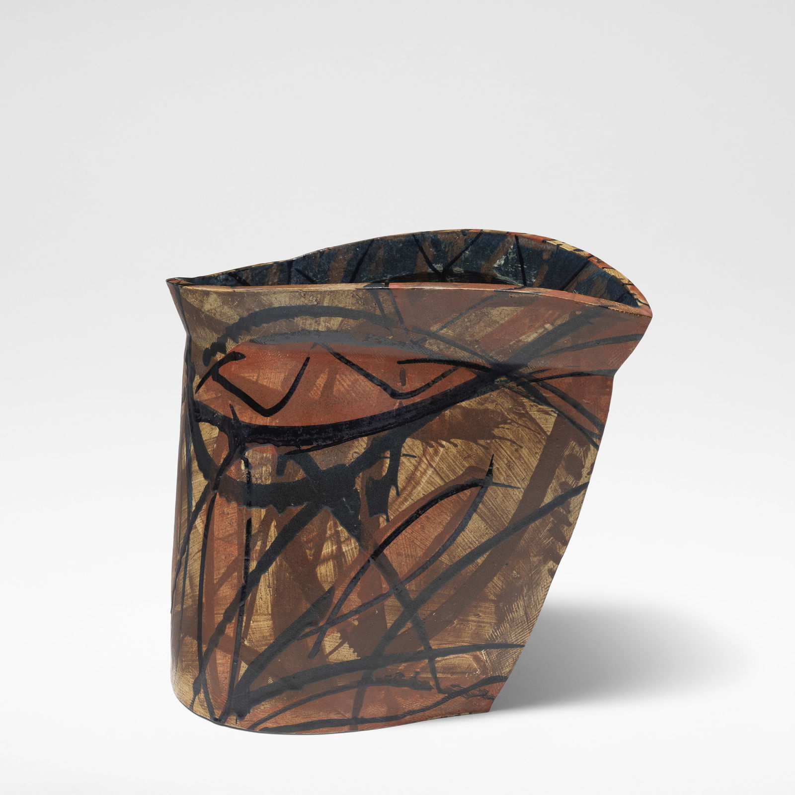 Alison Britton Abstract vase, 1986: Alison Britton Abstract vase, 1986 Stoneware, of high sided undulating form, with incised detail and applied glazes in shades of blue, brown and white. 29.5 cm high, 30 cm wide, 30 cm deep Incised to