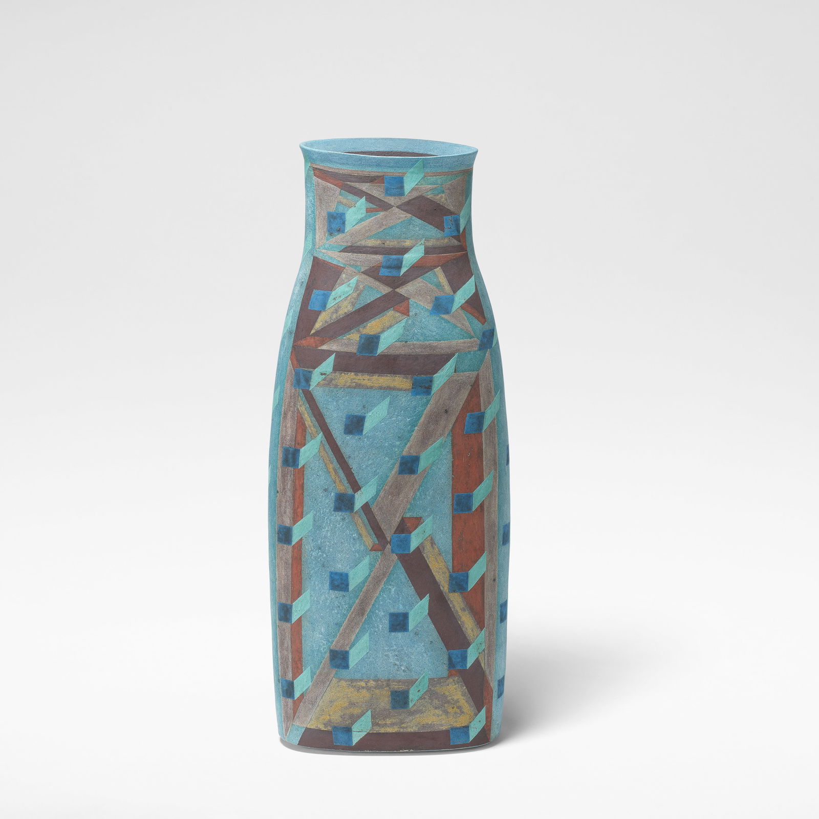 Elizabeth Fritsch 'Counterpoint' vessel, circa 1991: Elizabeth Fritsch 'Counterpoint' vessel, circa 1991 Hand-built stoneware, of flattened curved form, decorated with cubist motifs in polychrome slips against a blue ground. 39 cm high, 16 cm wide, 10 c