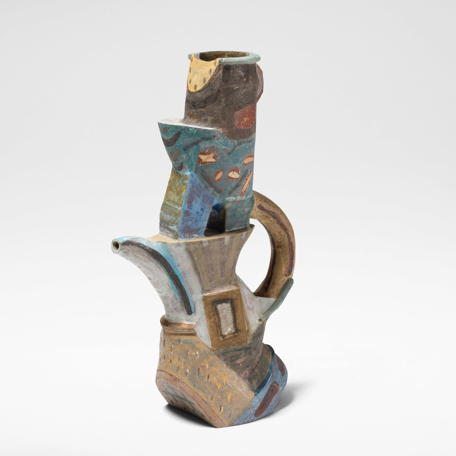 Angus Suttie 'Fantasy' teapot, circa 1986: Angus Suttie 'Fantasy' teapot, circa 1986 Earthenware, painted in vivid polychrome glazes with abstract designs and incised marks. 39.5 cm high, 24 cm wide, 12.5 cm deep Underside incised suttiE. Foot