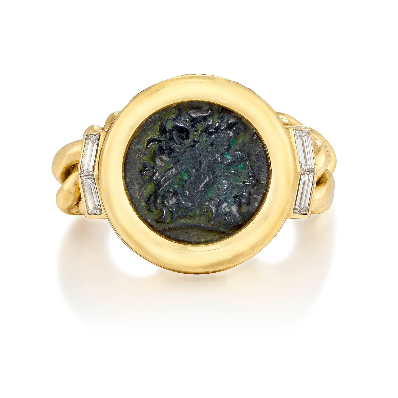 BULGARI: AN 18K GOLD AND DIAMOND 'MONETE' RING: BULGARI: AN 18K GOLD AND DIAMOND 'MONETE' RINGCentering an antique coin, flanked by baguette-cut diamonds, completed by a curb link chain shank; signed Bulgari; stamped 'Or Et Bronze'; with maker's