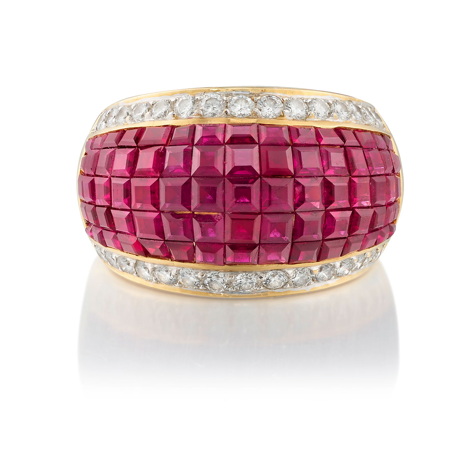 AN 18K GOLD, RUBY AND DIAMOND RING