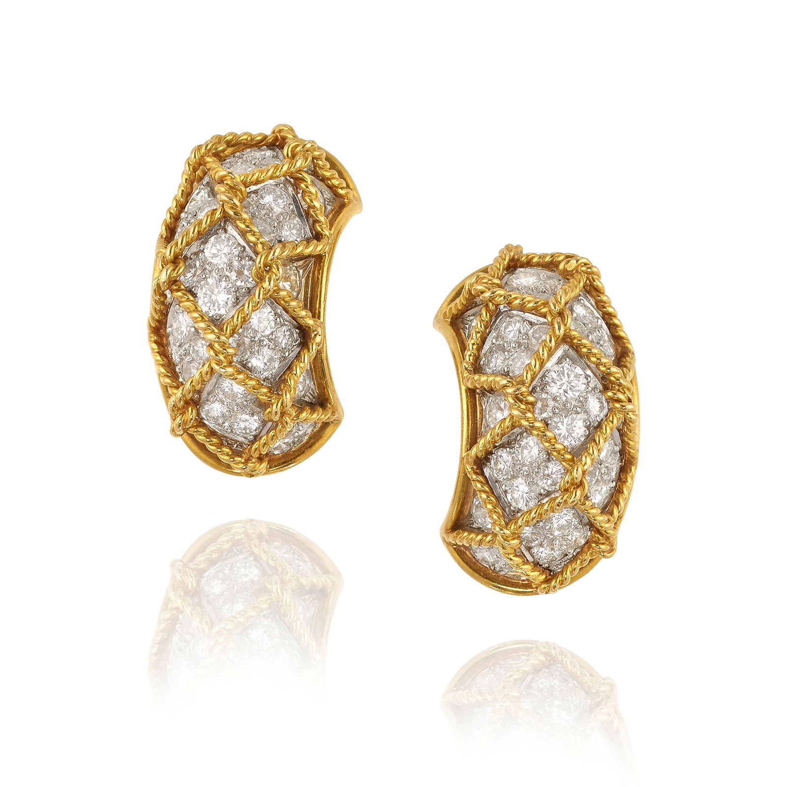 A PAIR OF DIAMOND EARCLIPS: A PAIR OF DIAMOND EARCLIPSEach accented with pavé-set, round brilliant-cut diamonds, completed by gold rope detailing; estimated total diamond weight 1.50 carats; mounted in platinum and 14k